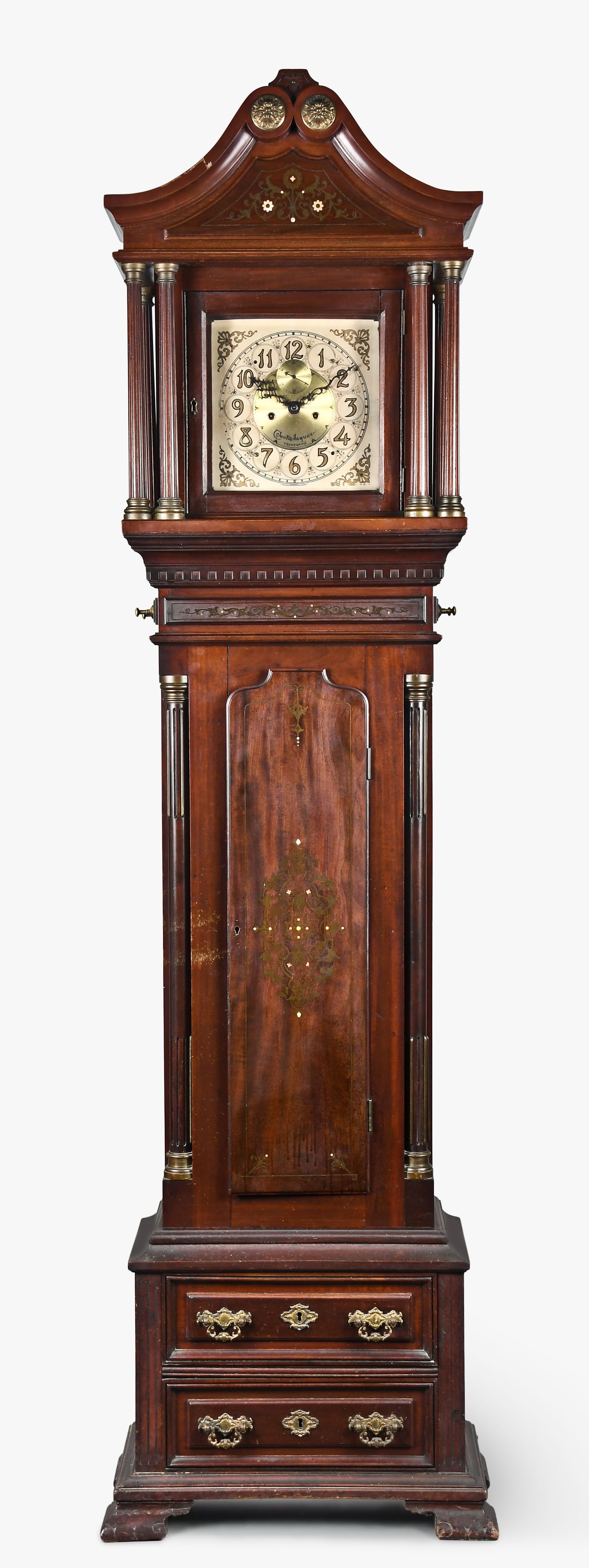 Seth Thomas Clock Co. tall clock: Seth Thomas Clock Co., Thomaston, Conn., tall clock in a carved mahogany case with mother of pearl inlay, arabic numeral brass dial signed Cook & Jaques, Trenton, NJ, 8 day, time and strike, weight dr
