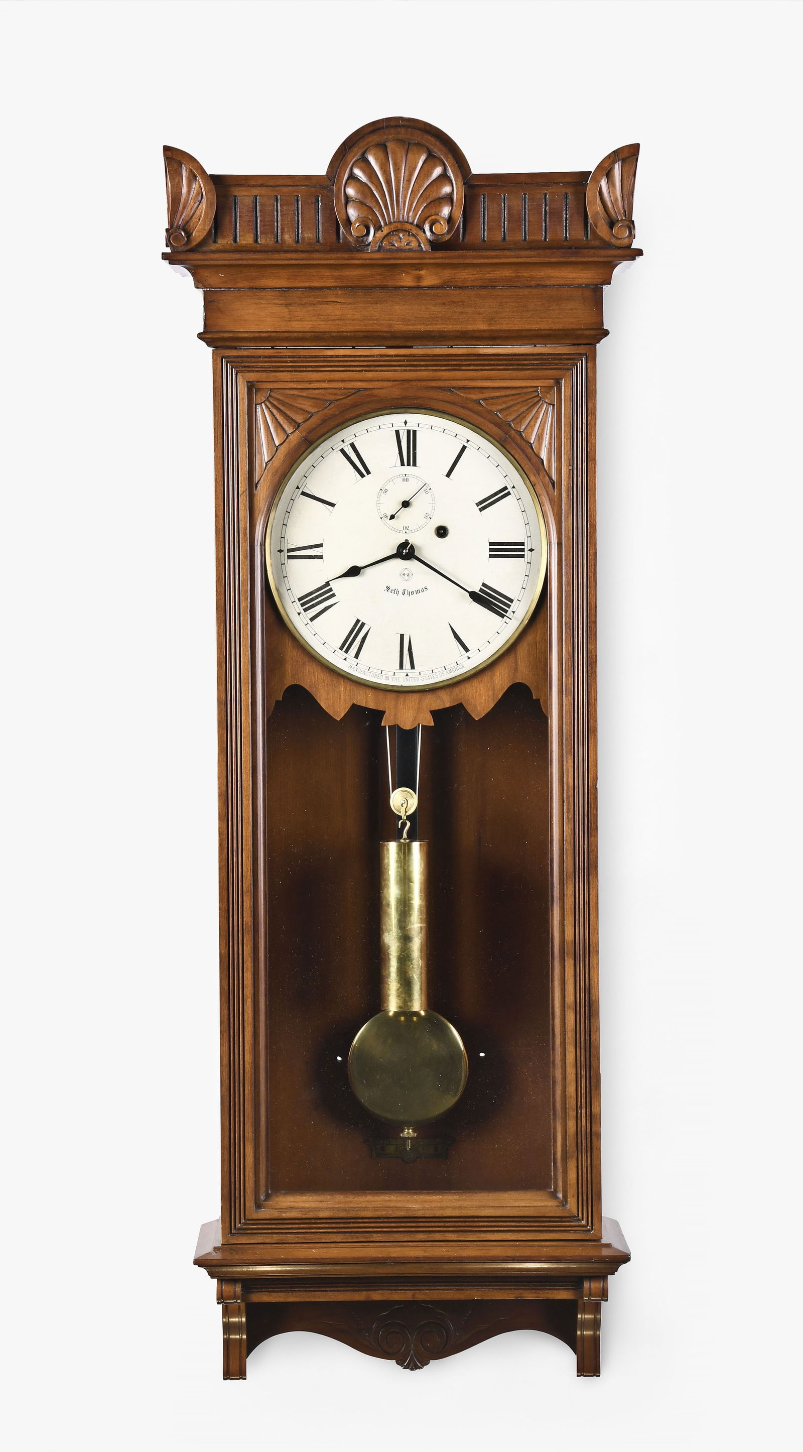 Seth Thomas Clock Co. Regulator No. 9 wall clock: Seth Thomas Clock Co., Thomaston, Conn., "Regulator No. 9" wall clock in a cherry case, painted metal dial, blued steel spade hands, and eight day, weight driven brass movement