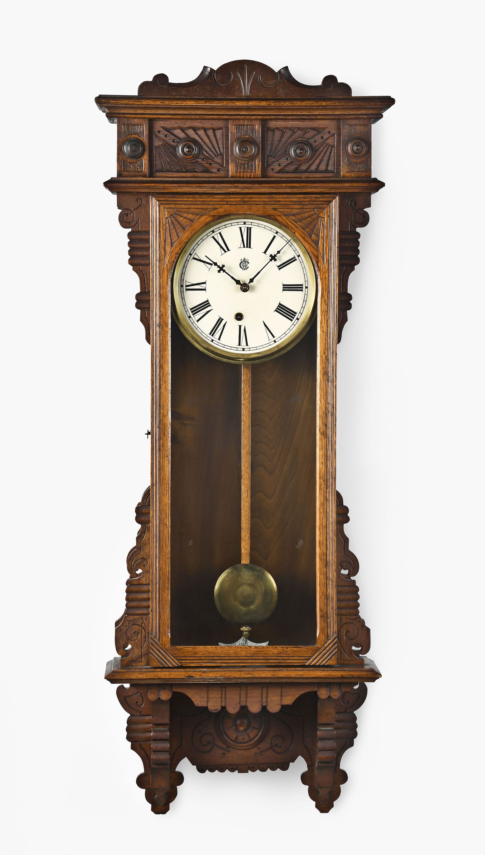 Waterbury Clock Co. Surrey oak wall clock: Waterbury Clock Co., Waterbury, Conn., "Surrey" wall clock in a pressed oak case with painted metal dial, eight day time only spring driven movement