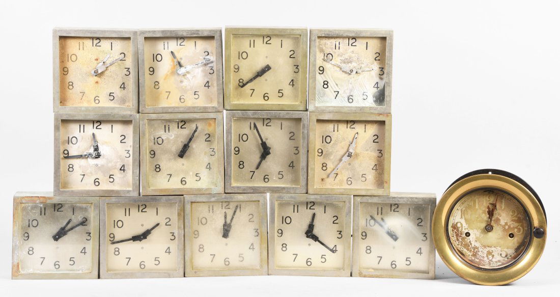 Thirteen Art Deco slave clocks (1 of 2)