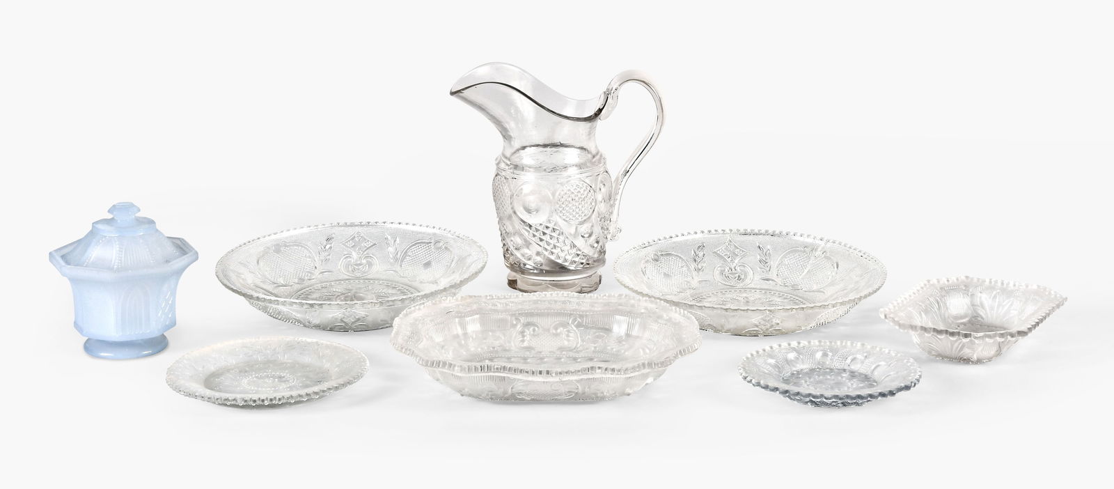 A lot of eight pieces of Sandwich and Pittsburgh type lacy pressed glass (1 of 2)