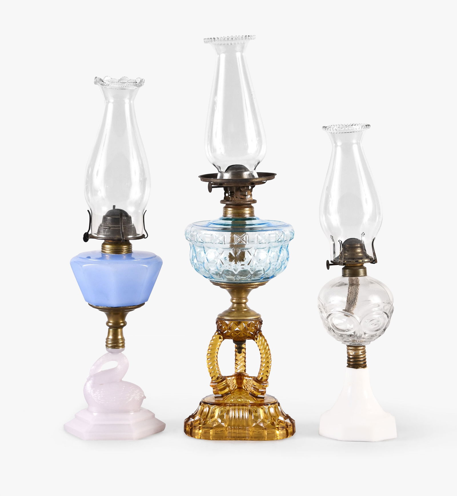 A lot of three decorative kerosene lamps (1 of 4)