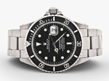 A Rolex stainless steel reference 16610 Submariner wrist watch