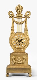 An interesting second quarter 19th century French gilt bronze lyre clock