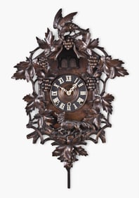 Black Forest cuckoo and quail wall clock carved with fox and grapes motif