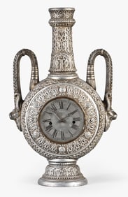 E.N. Welch Mfg. Co. Unknown No. 25 mantel clock with spelter amphorae form case