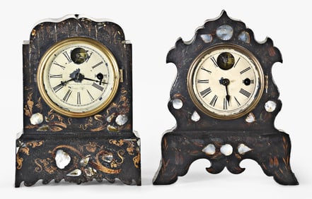 Two cast iron mother of pearl decorated shelf clocks with Noah Pomeroy balance wheel movements