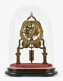 A good mid 19th century English two train skeleton clock signed John Moore & Sons