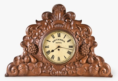 A mid 19th century English carved gallery clock