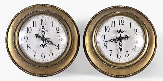 Two Magneta Clock Co. electromechanical slave clocks
