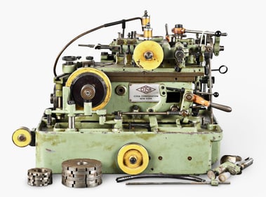A small mid 20th century Swiss automatic watch pinion cutting machine