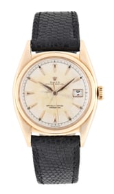 A mid 20th century rose gold Rolex ref. 6075 wrist watch with roulette date