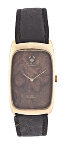 A late 20th century 18 karat gold Rolex ref. 4108 Cellini wrist watch with burl walnut dial