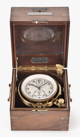 A mid 20th century Elgin model 600 marine chronometer featured in Whitney's Military Timepieces