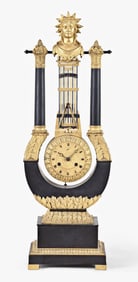 A good Charles X gilt and patinated bronze lyre form mystery clock