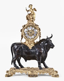 A good late 19th century French gilt and patinated bronze bull clock