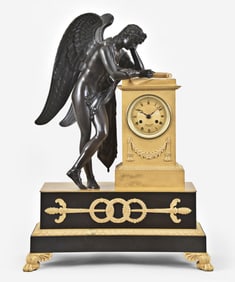 A good French Empire gilt and patinated bronze figural mantel clock signed Lebaury a Paris