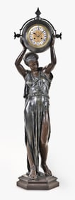 A very large late 19th century French patinated spelter figural clock signed H. Dumaige