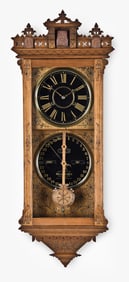 An Ithaca Clock Co. Hanging 5 1/2 Belgrade calendar clock