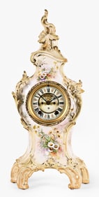 An Ansonia La Grande porcelain mantel clock