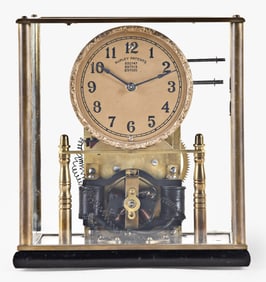An interesting early 20th century self winding shelf clock by George Rupley