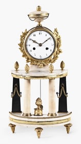 A small late 18th century French mantel clock