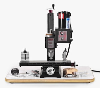 A Sherline 5400 vertical milling machine with accesories