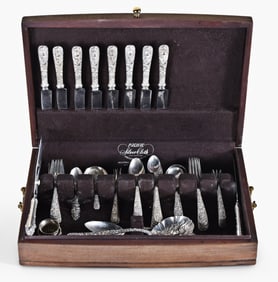 An S. Kirk & Son sterling silver flatware service in Repousse pattern