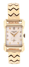 A mid 20th century man's gold Longines wrist watch