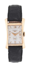 A good mid 20th century mans gold Longines wrist watch