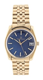 A mid 20th century gold Universal Geneve tuning fork wrist watch