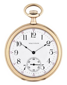An early 20th century gold 12 size Waltham pocket watch