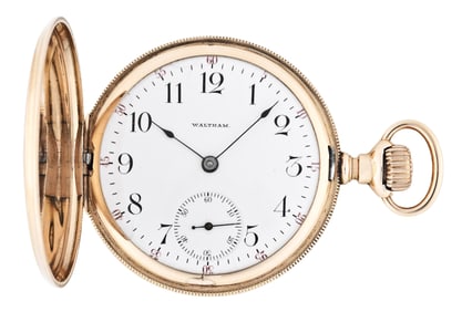 An early 20th century gold Waltham 16 size pocket watch