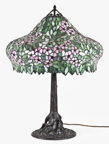 A large table lamp with copper foil shade & bronze base attributed to Unique Art Glass & Metal Co