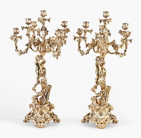 An exceptional pair of late 19th century French rococo gilt bronze candelabra