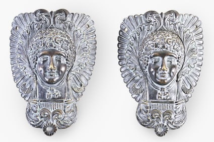 A lot of four cast bronze mid 19th century figural billiard table pockets