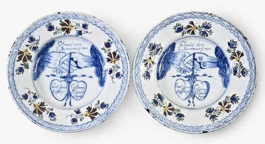A lot of two early 19th century Dutch Delft polychrome marriage plate