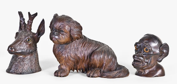 A lot of three late 19th - mid 20th century Black Forest carved inkwells