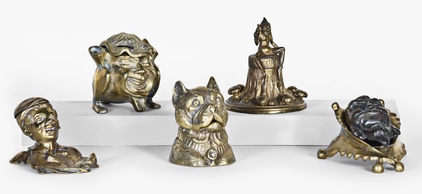 A lot of five late 19th - early 20th century cast brass figural inkwells