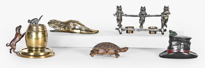 A lot of five late 19th and 20th century figural desk accessories