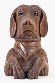 A good late 19th - early 20th century Black Forest carved dachshund tobacco box