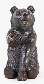 A good early 20th century Black Forest carved bear form tobacco box