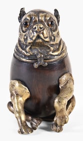 A very appealing early 20th century European bronze and walnut pug form tobacco box