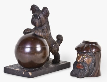 A lot of two early 20th century figural carved wood tobacco jars