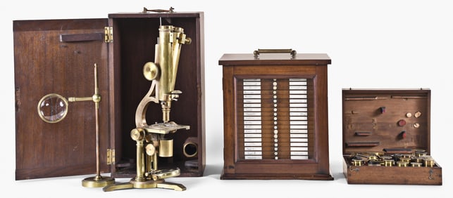 A good Zentmayer Grand American binocular microscope with box of lenses and cased slides