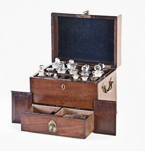 A 19th century doctor's medicine chest and four dental tools including two tooth keys: A mid 19th century English doctor's or apothecary's medicine chest, in mahogany with brass hardware, the top hinged and concealing a divided well with bottles and compartment for ointment slab, the dr