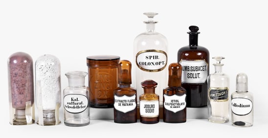 A good lot of colored and colorless glass apothecary bottles