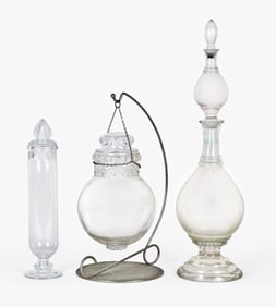 A good lot of early to mid 20th century pharmacy or general store show bottles and globes