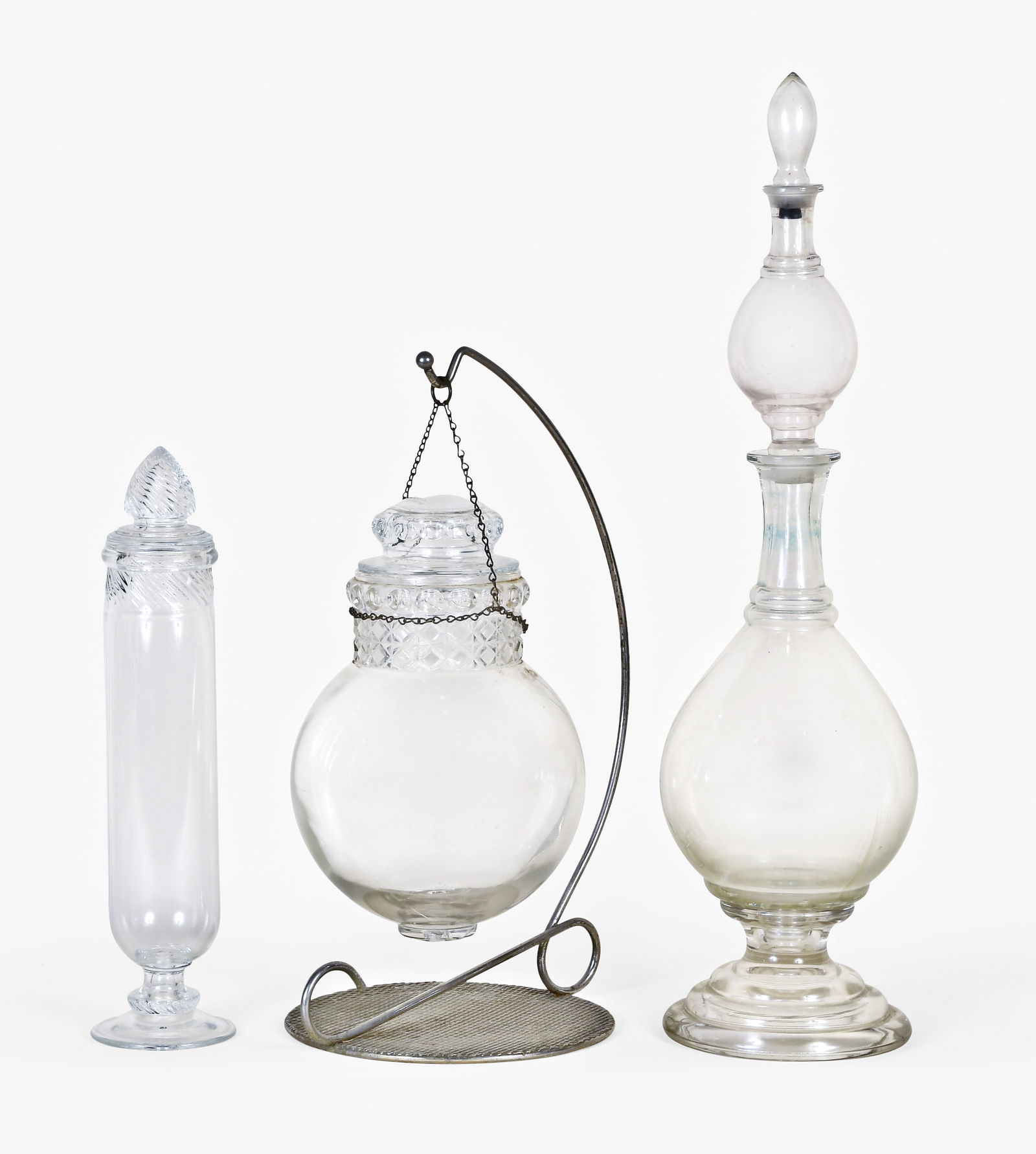 A good lot of early to mid 20th century pharmacy or general store show bottles and globes (1 of 3)