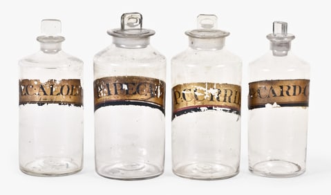 A lot of eight mid 19th - early 20th century apothecary jars and a cobalt blue poison bottle